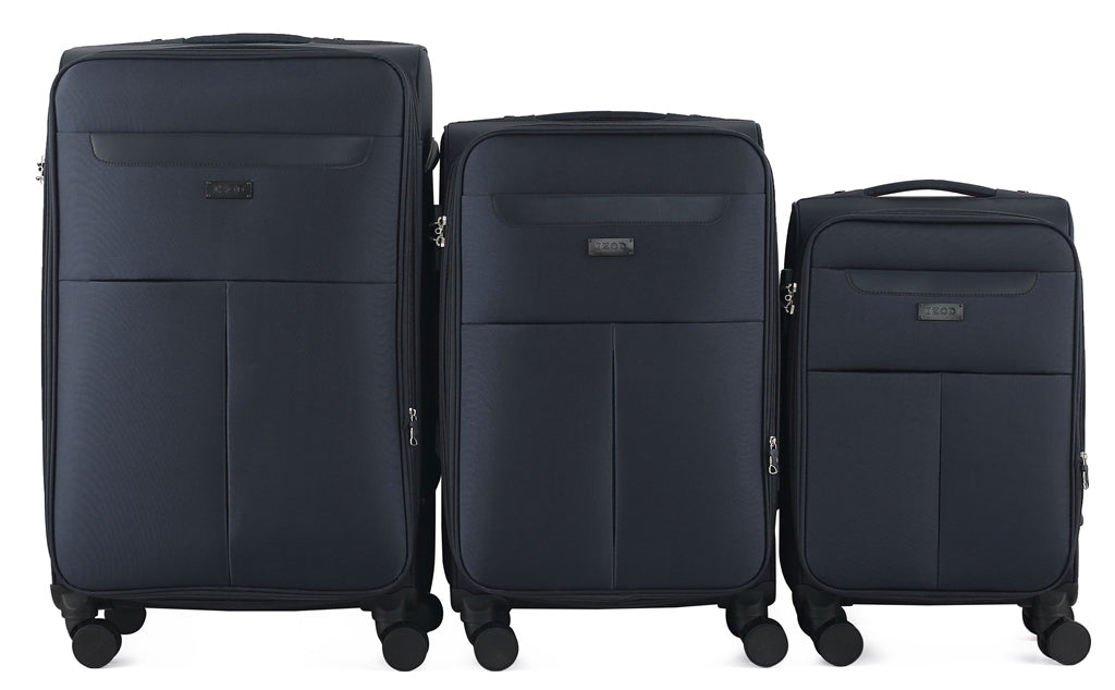 Three navy blue suitcases of different sizes on a white background