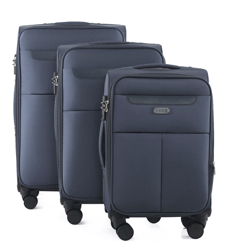 Set of three navy blue suitcases of different sizes on a white background