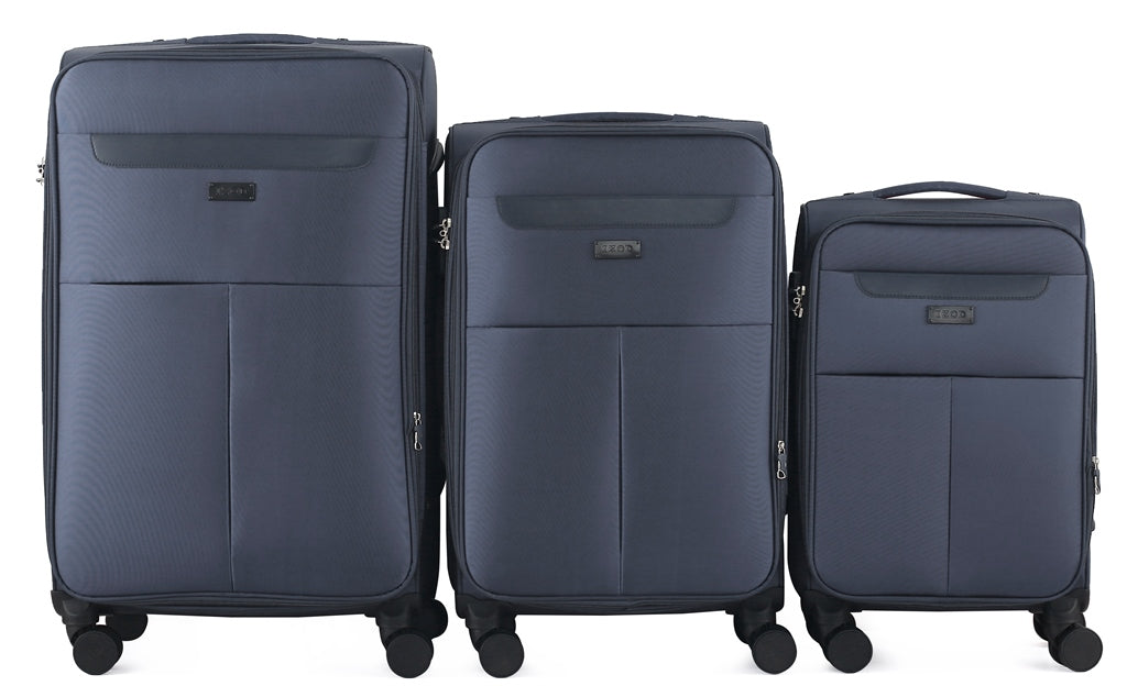 Three navy blue suitcases of different sizes on a white background
