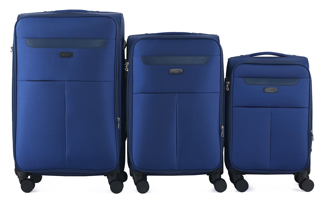Three blue suitcases of different sizes on a white background