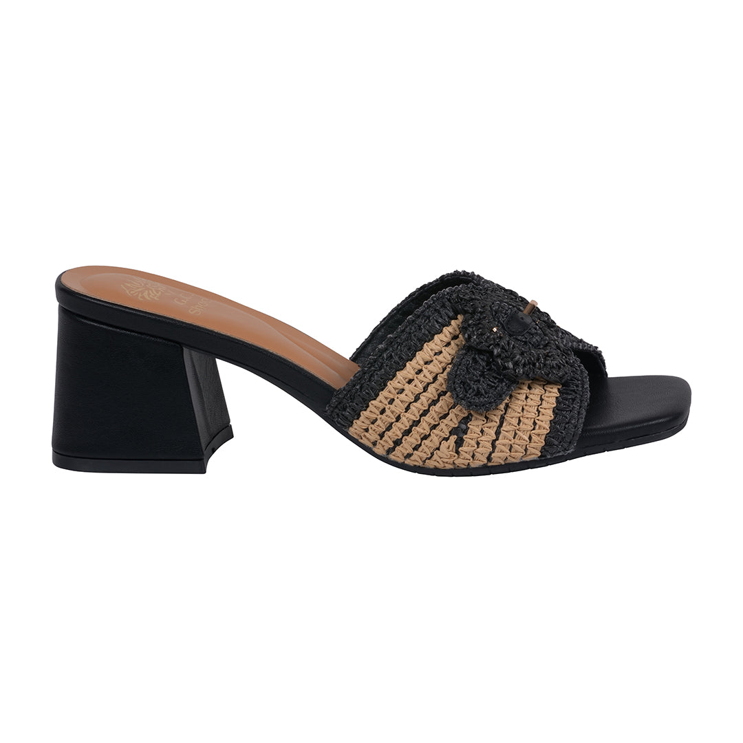 Black and brown woven sandal with a block heel on a white background