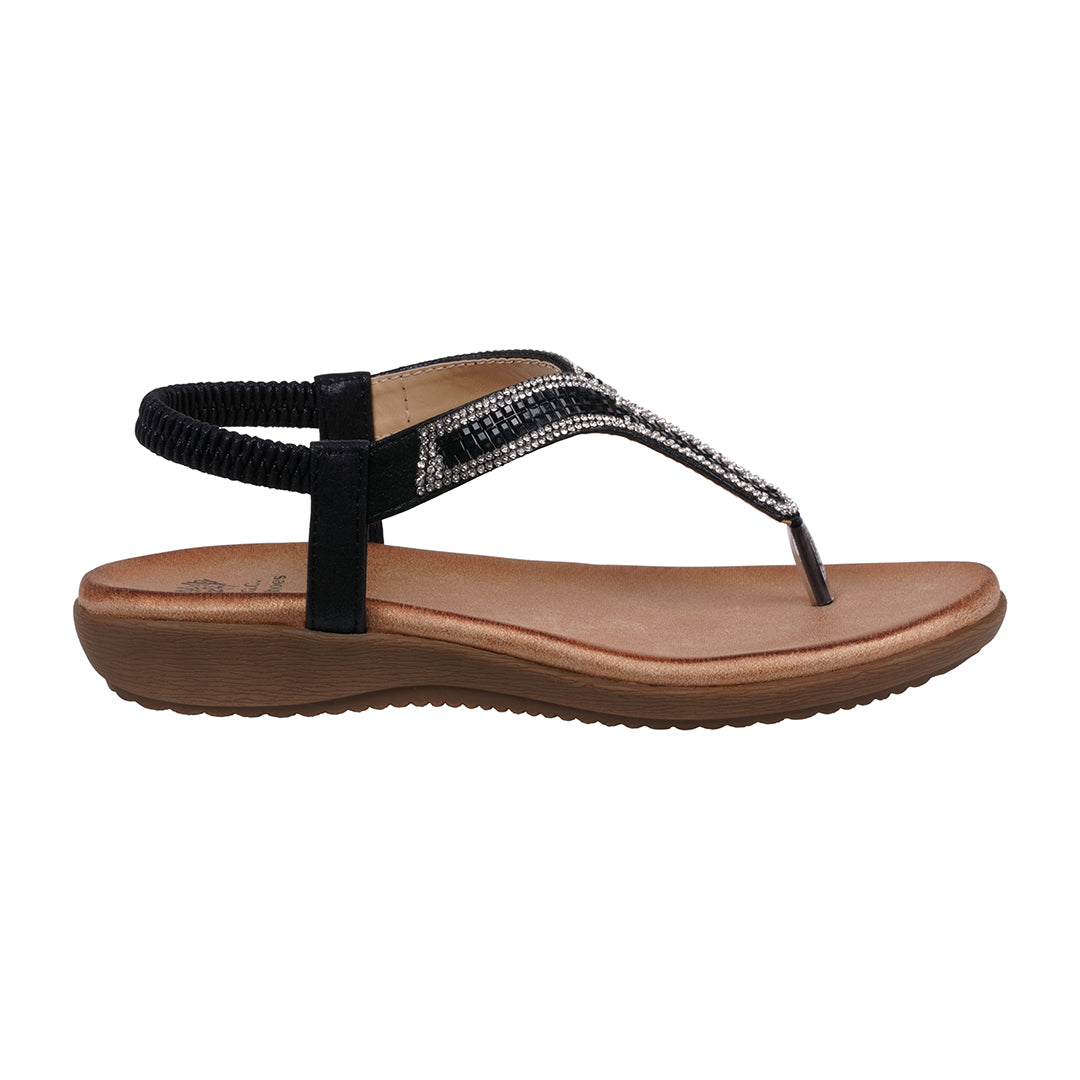 Black sandal with brown sole on a white background