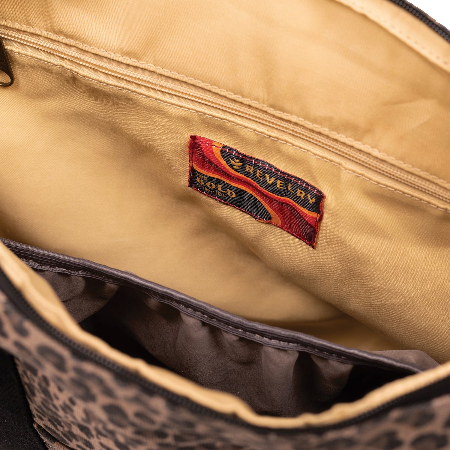 Close-up of a beige bag with a visible label inside