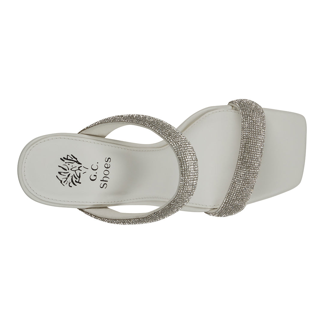 White sandal with rhinestone strap on a white background, featuring the G.C. Shoes brand.