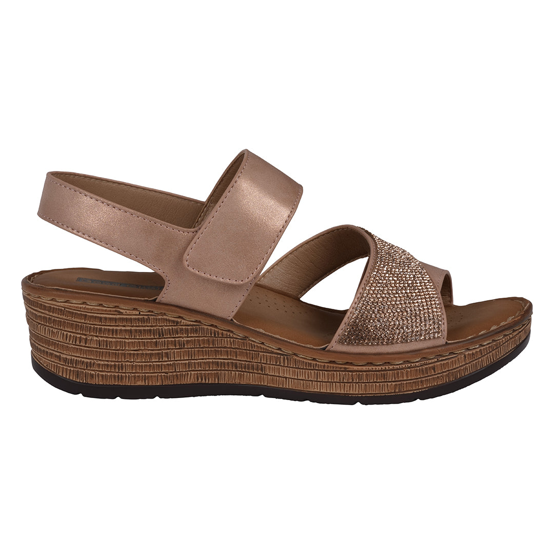 Brown wedge sandal on a white background