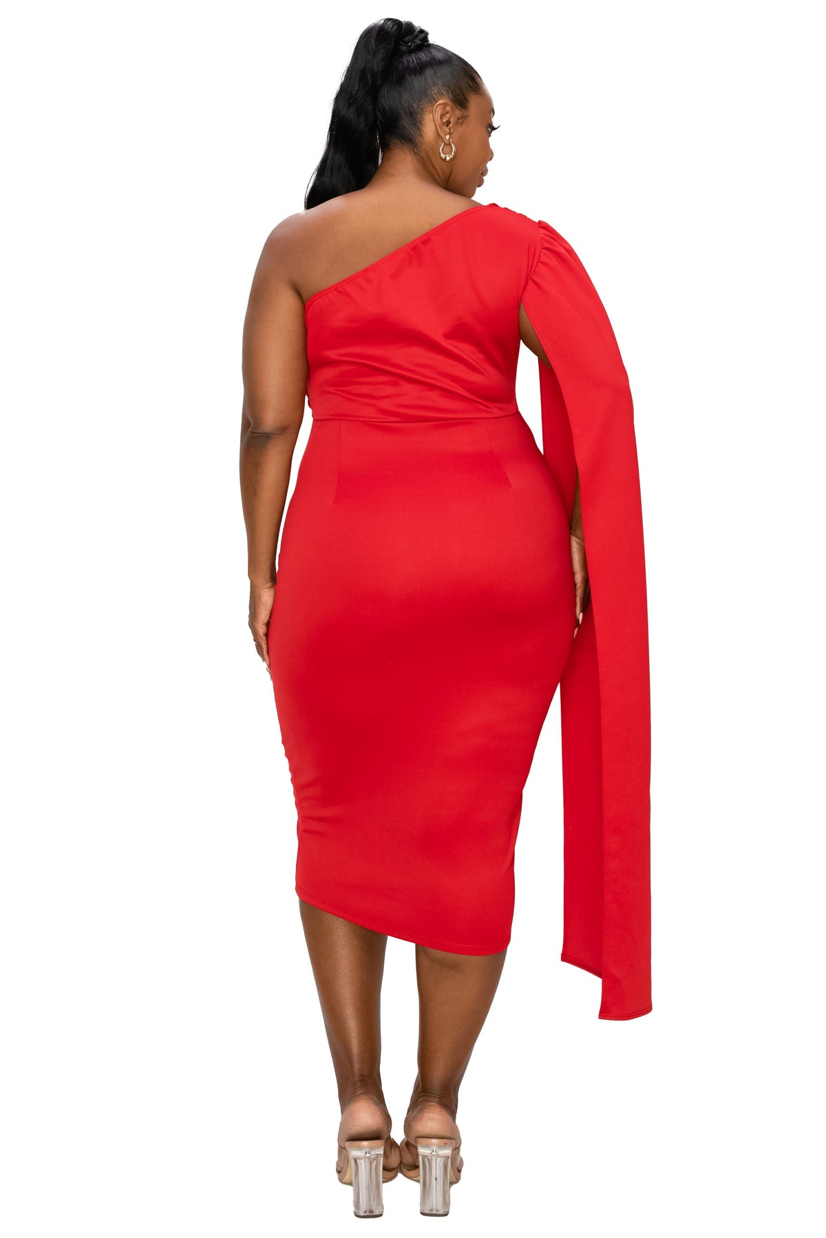 A woman modeling a bright red one-shoulder midi dress with a long draped sleeve, shown from the back against a plain white background.