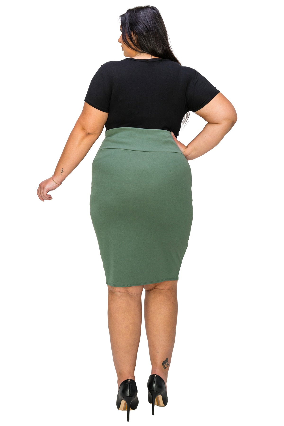 A woman shown from the back wearing a black short-sleeve top and an olive green high-waisted pencil skirt, paired with black high heels, against a plain white background.
