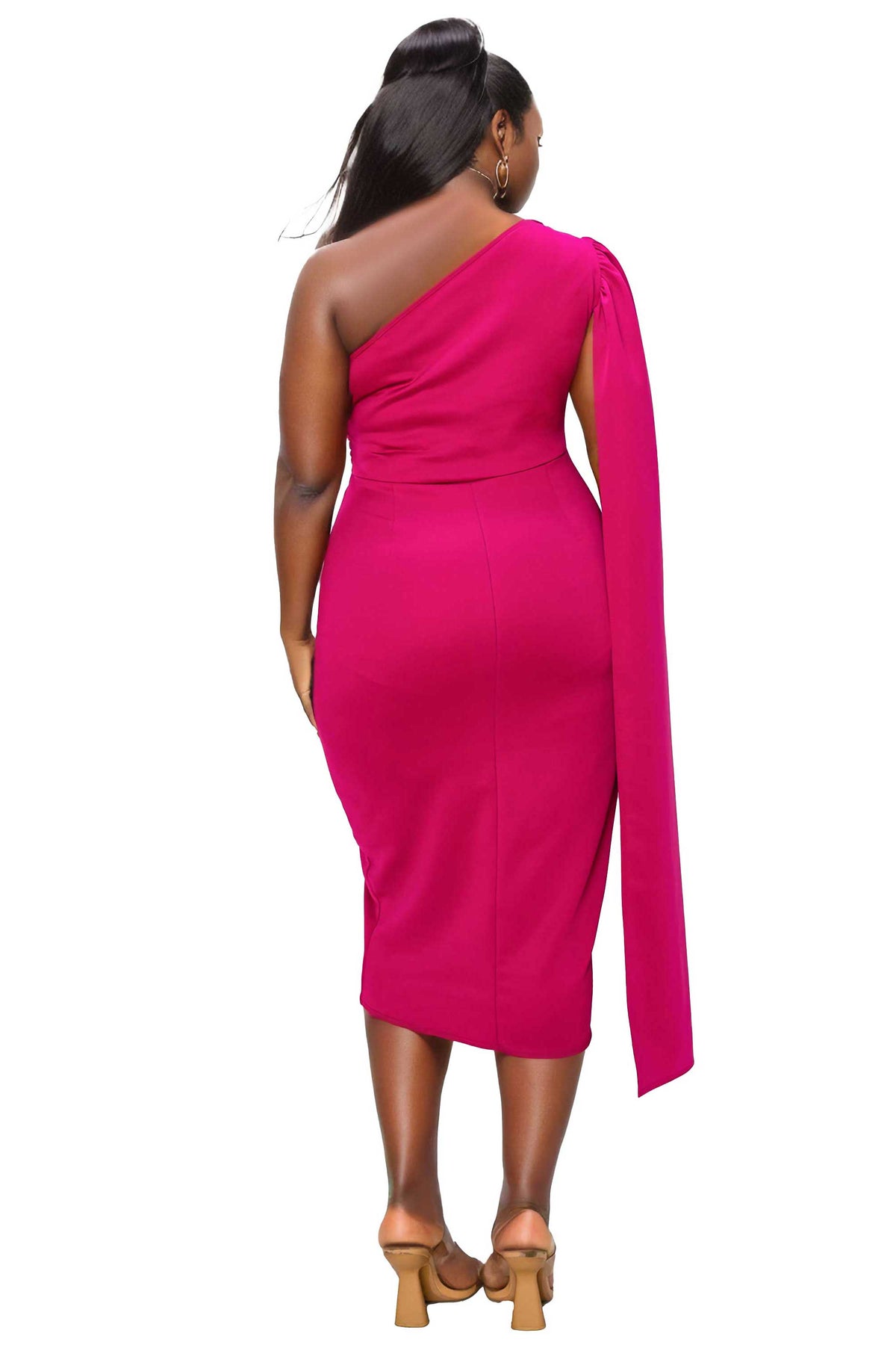 A woman shown from the back wearing a bright fuchsia one-shoulder midi dress with a long draped sleeve, paired with tan block-heel mules, against a plain white background.