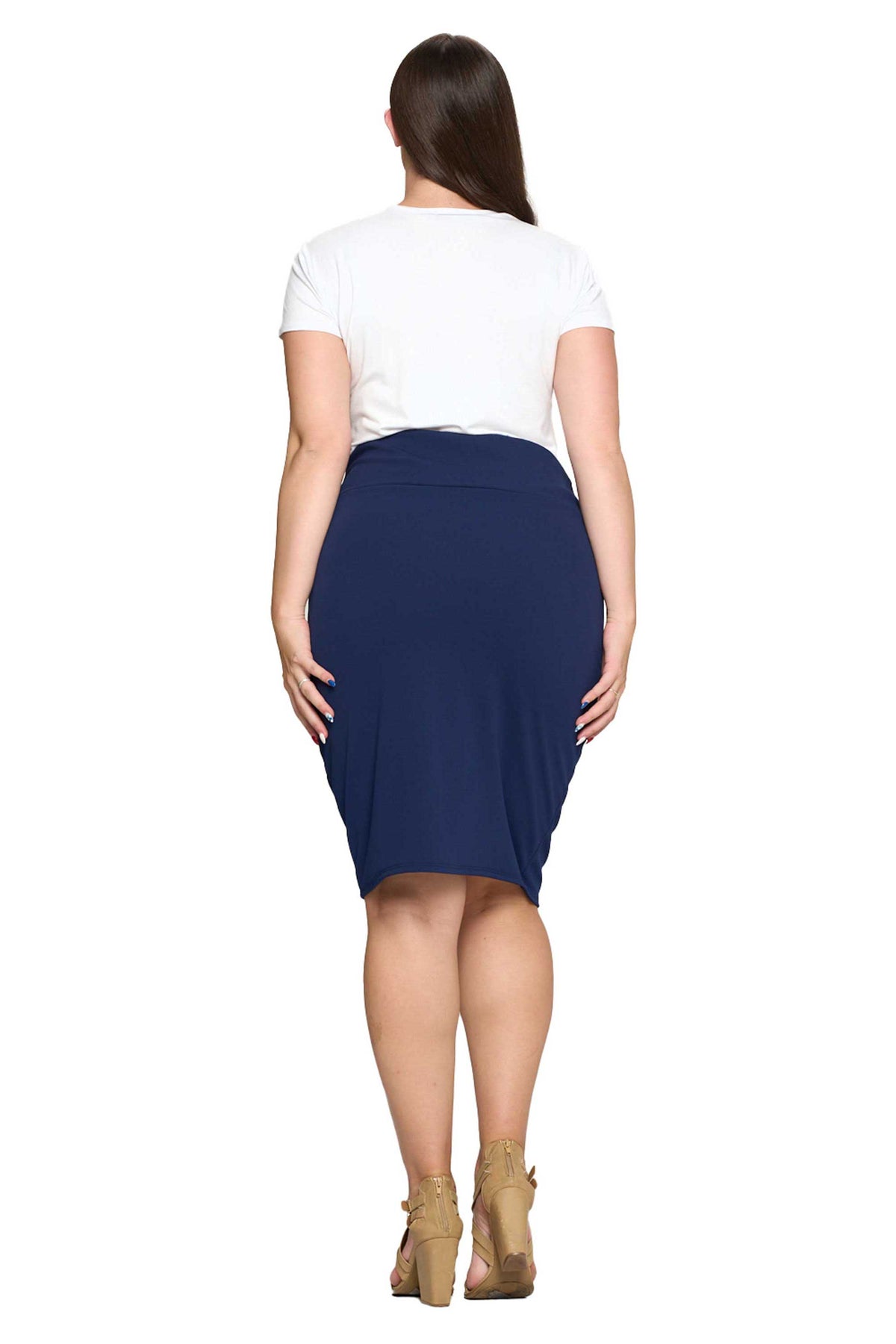 A woman shown from the back wearing a white short-sleeve t-shirt and a navy blue knee-length fitted skirt, paired with tan high-heeled sandals, against a plain white background.