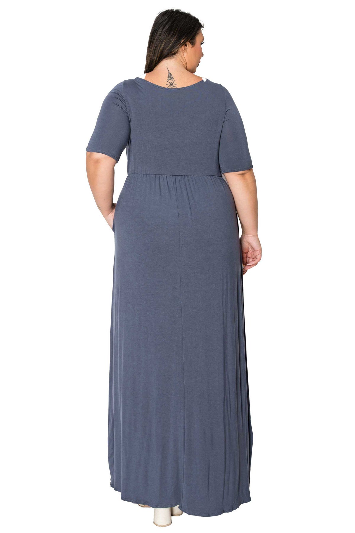 A woman modeling a slate blue-gray short-sleeve maxi dress from the back, shown against a plain white background.