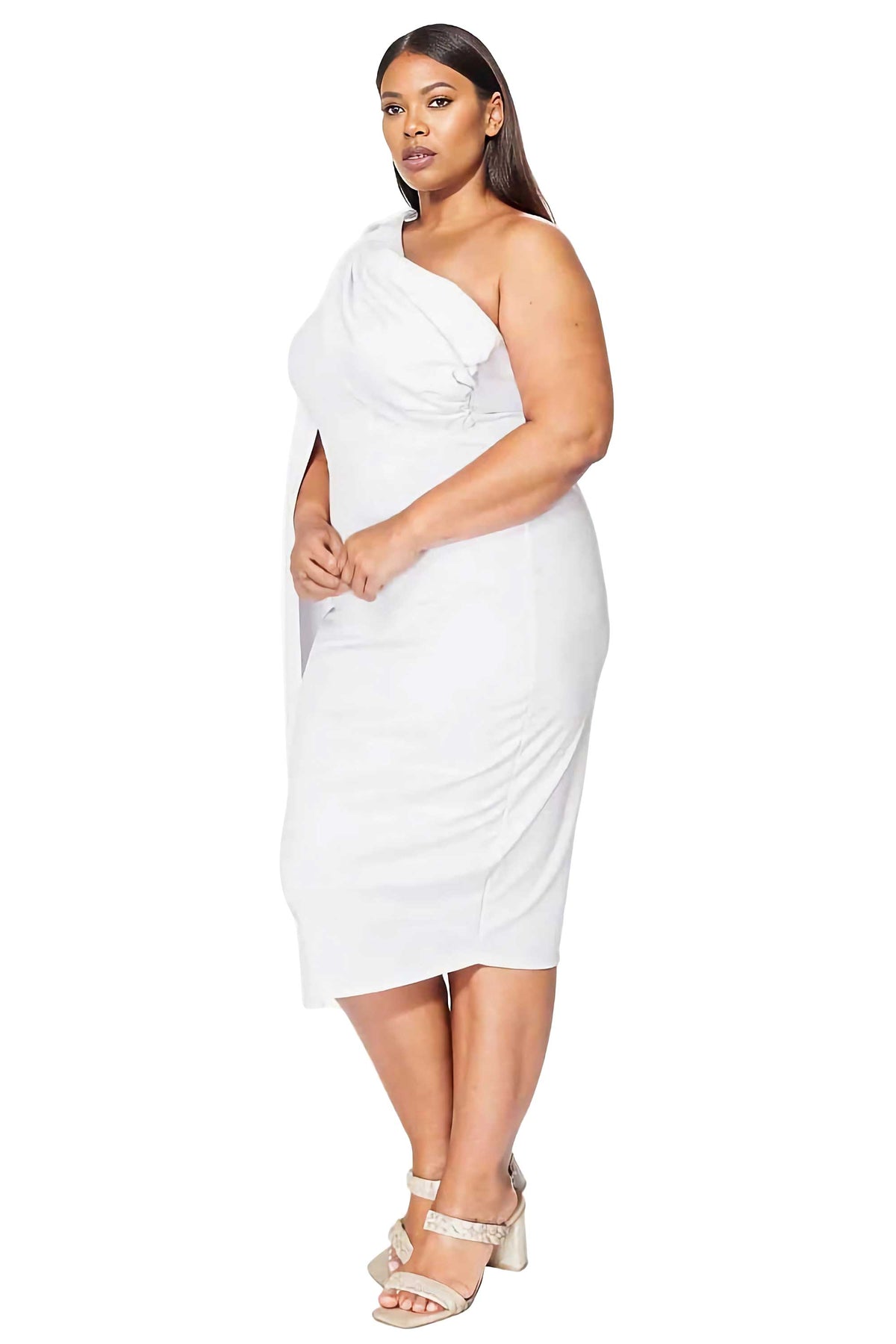 A woman modeling a white one-shoulder midi dress with a ruched neckline, paired with light beige heeled sandals, against a plain white background.
