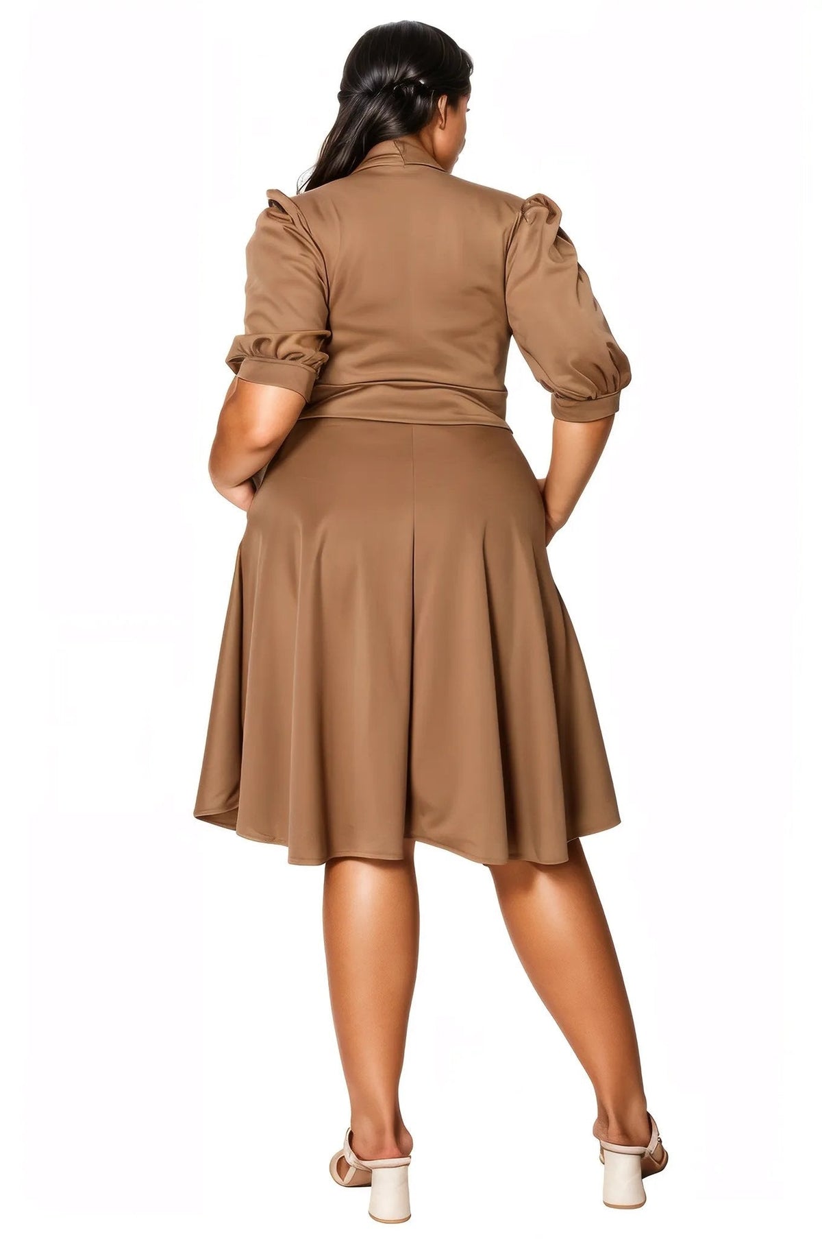 A woman shown from the back wearing a brown puff-sleeve dress with a flared skirt, paired with white heeled sandals, against a plain white background.