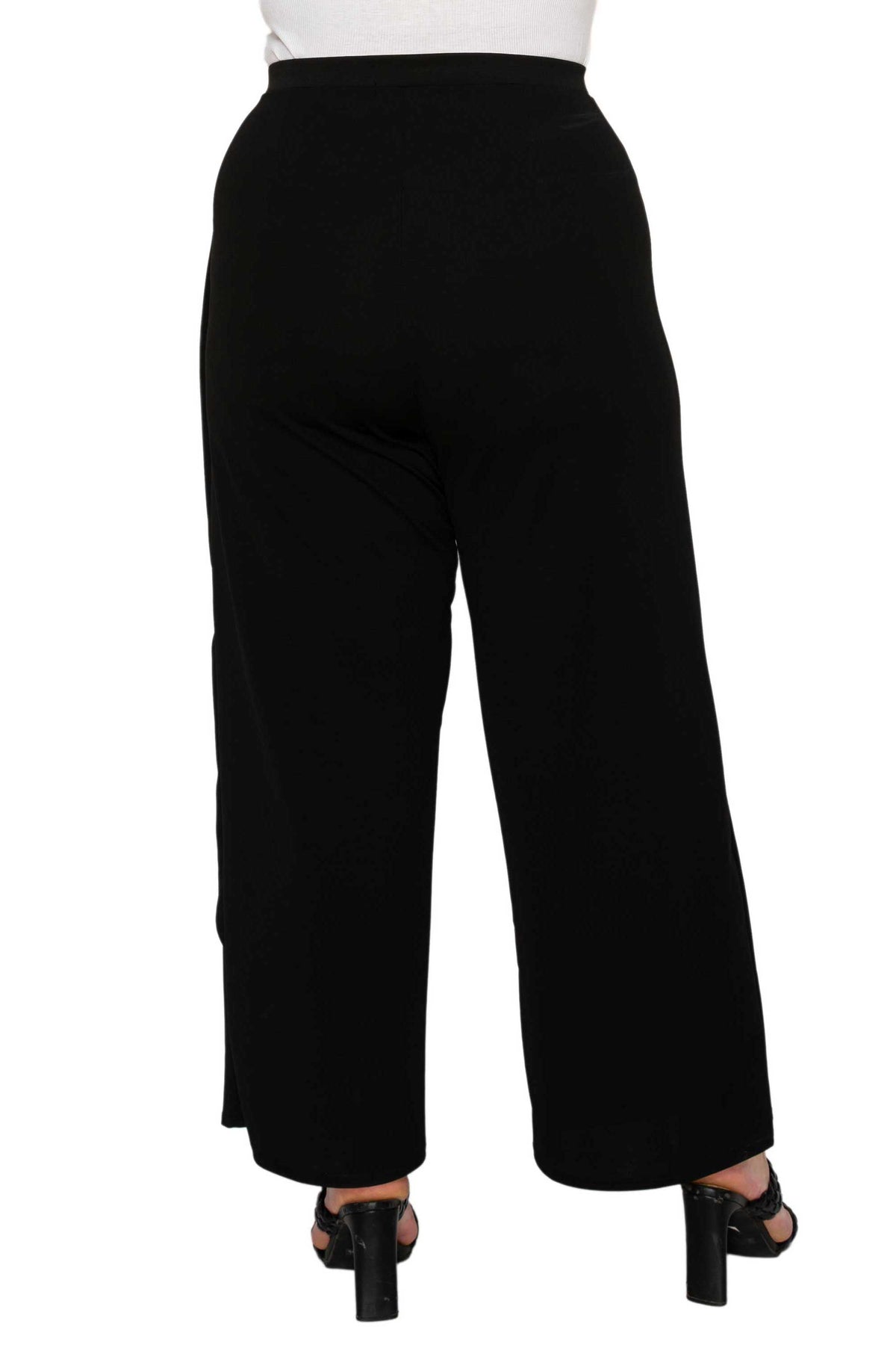 Black wide-leg cropped pants shown from the back on a model, paired with a white top and black high-heeled sandals against a plain white background.