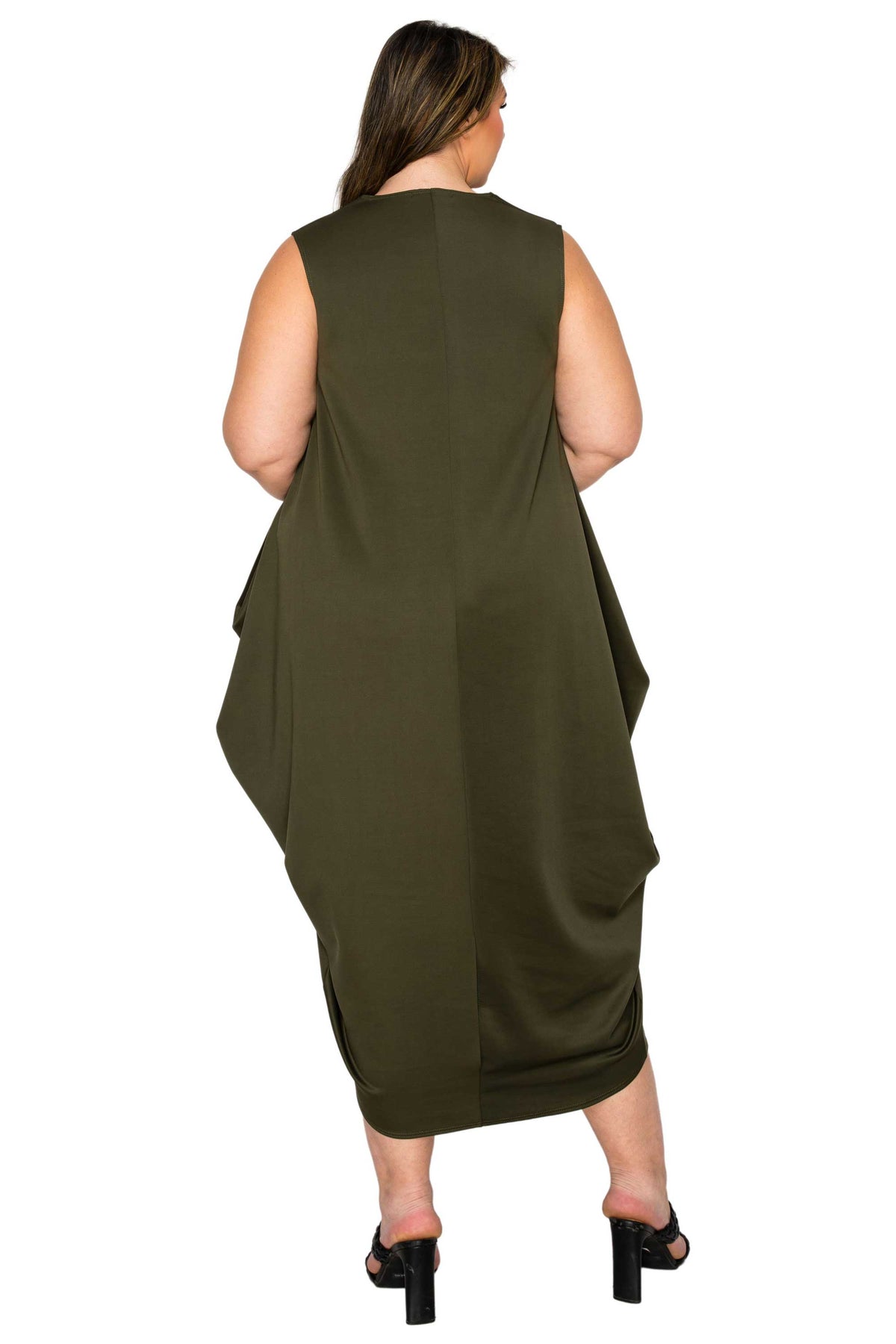 A woman shown from the back wearing a sleeveless olive green midi dress with draped side panels and black heeled sandals, photographed against a plain white background.
