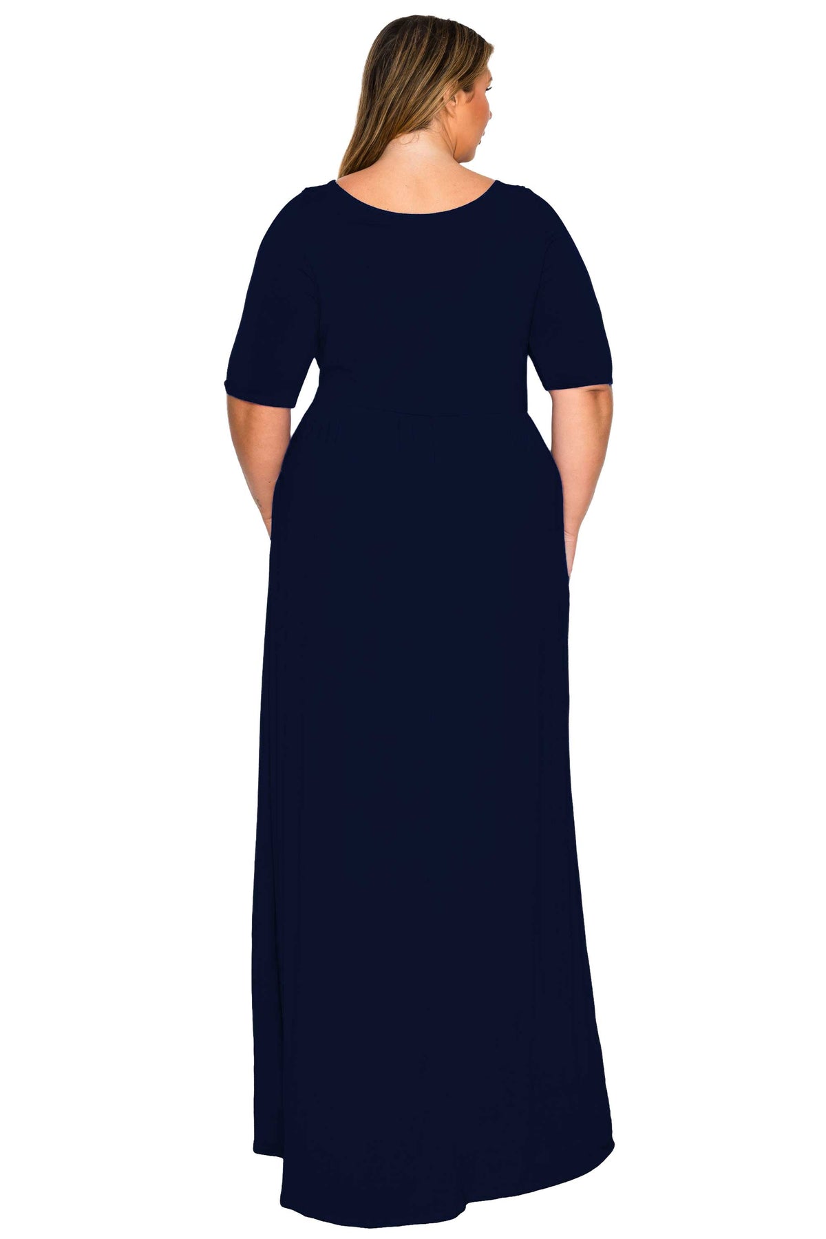 A woman viewed from the back wearing a navy blue short-sleeve maxi dress with side pockets, set against a plain white background.