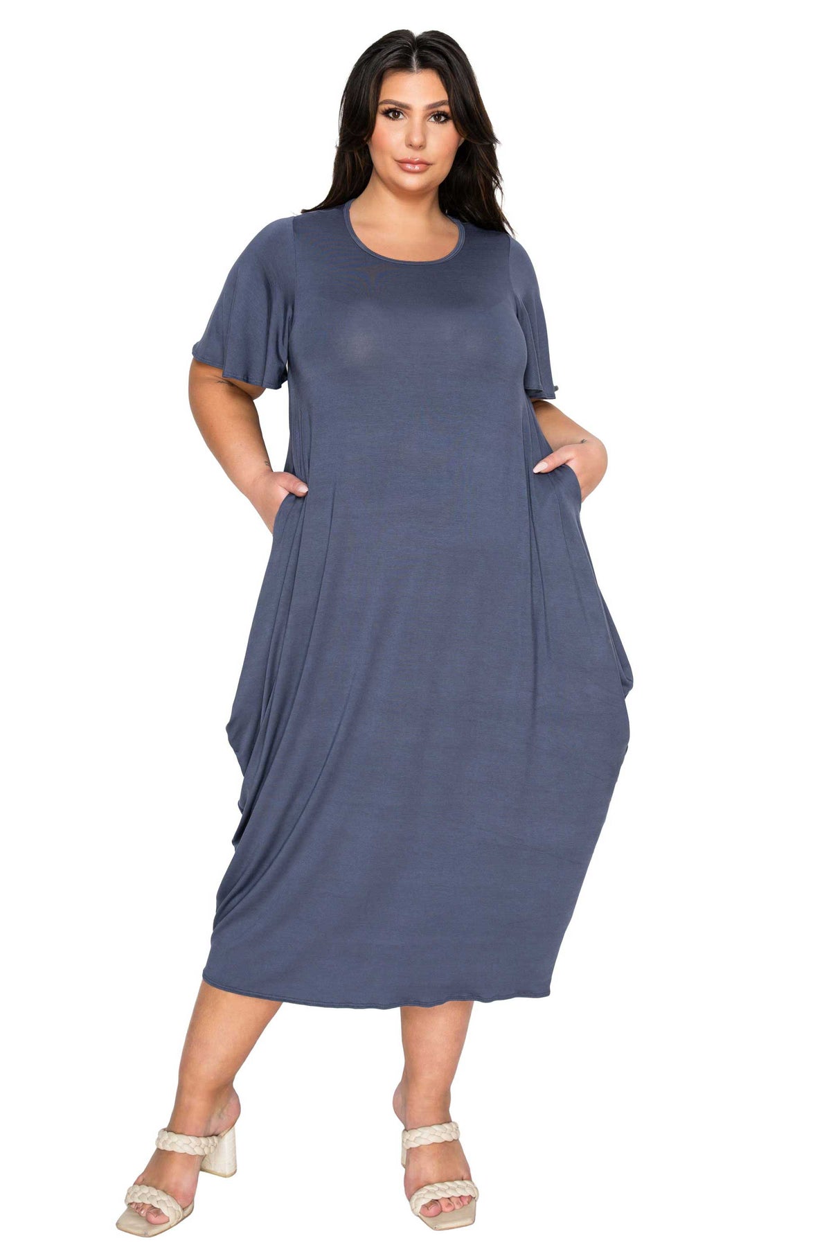 Woman wearing a blue dress on a white background