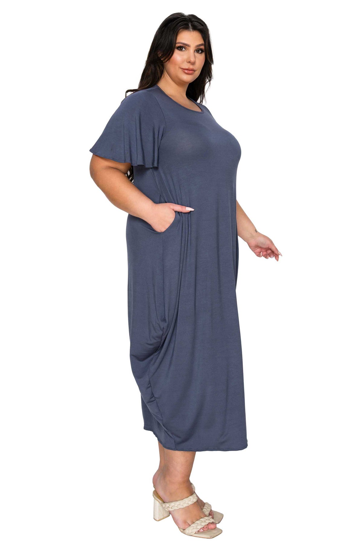 Woman wearing a blue dress on a white background