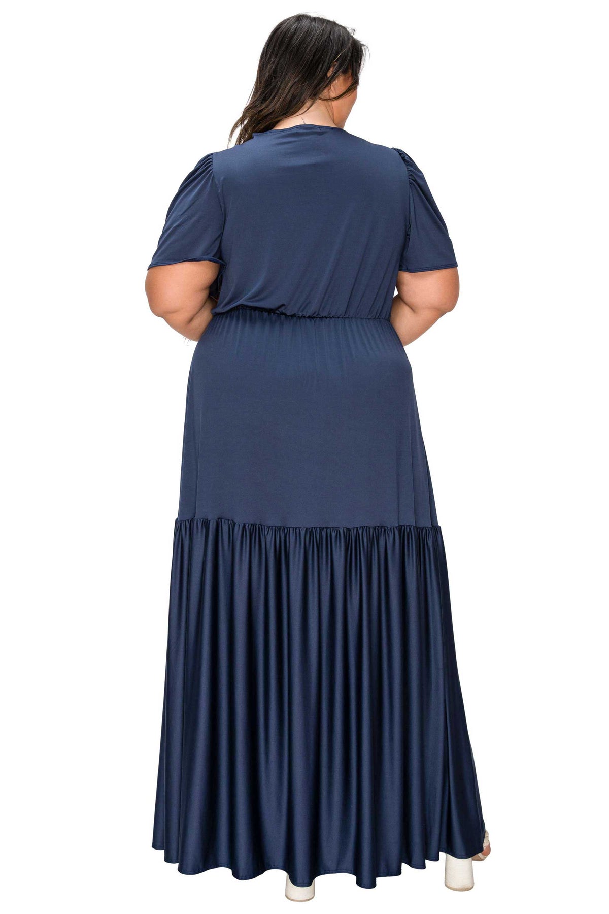 Navy blue dress with a layered skirt on a white background