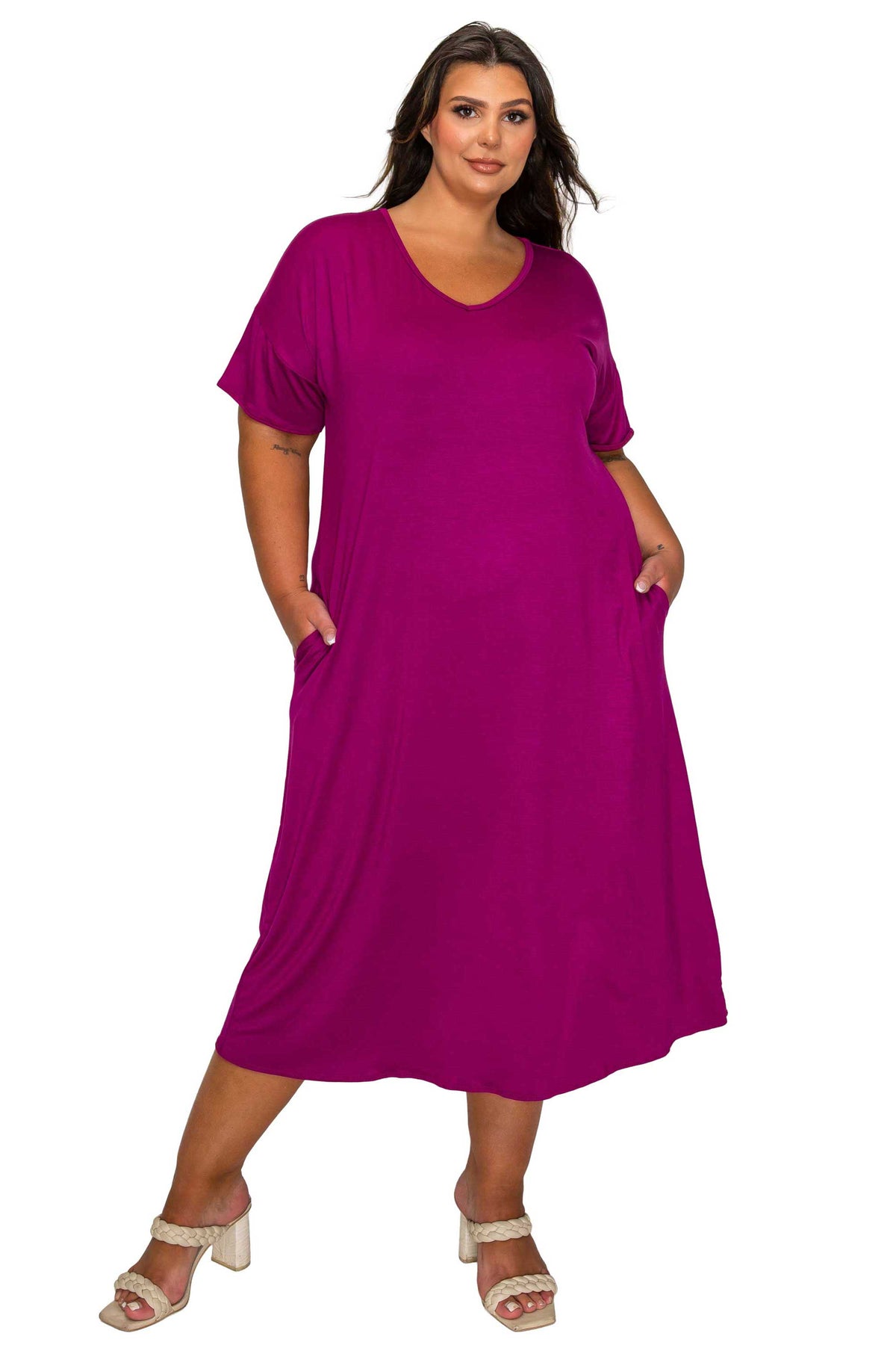 Woman wearing a purple dress on a white background