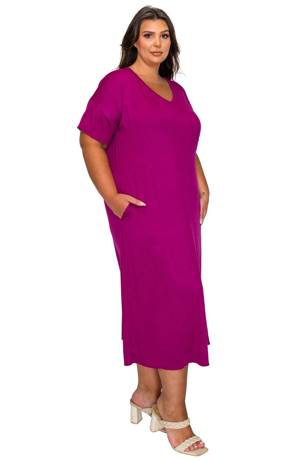 Woman wearing a purple dress on a white background