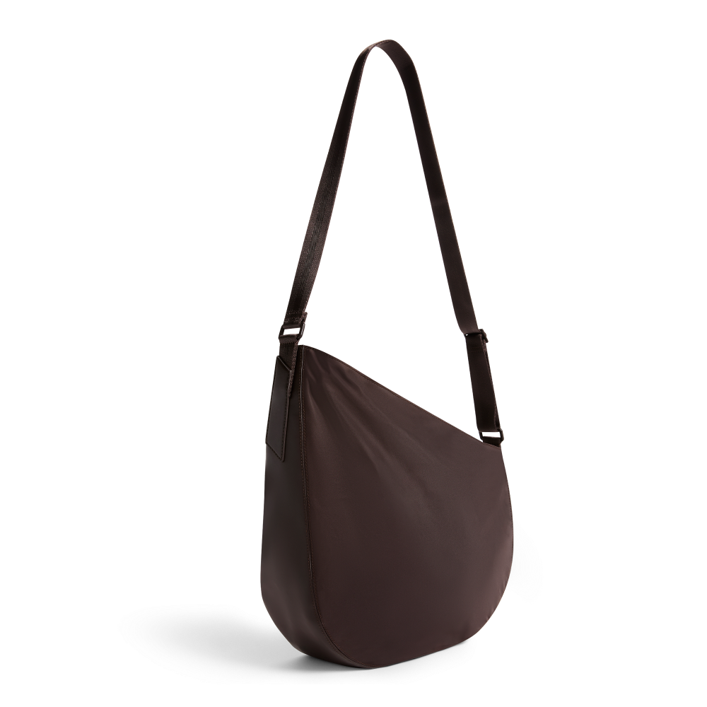 Brown shoulder bag on a white background