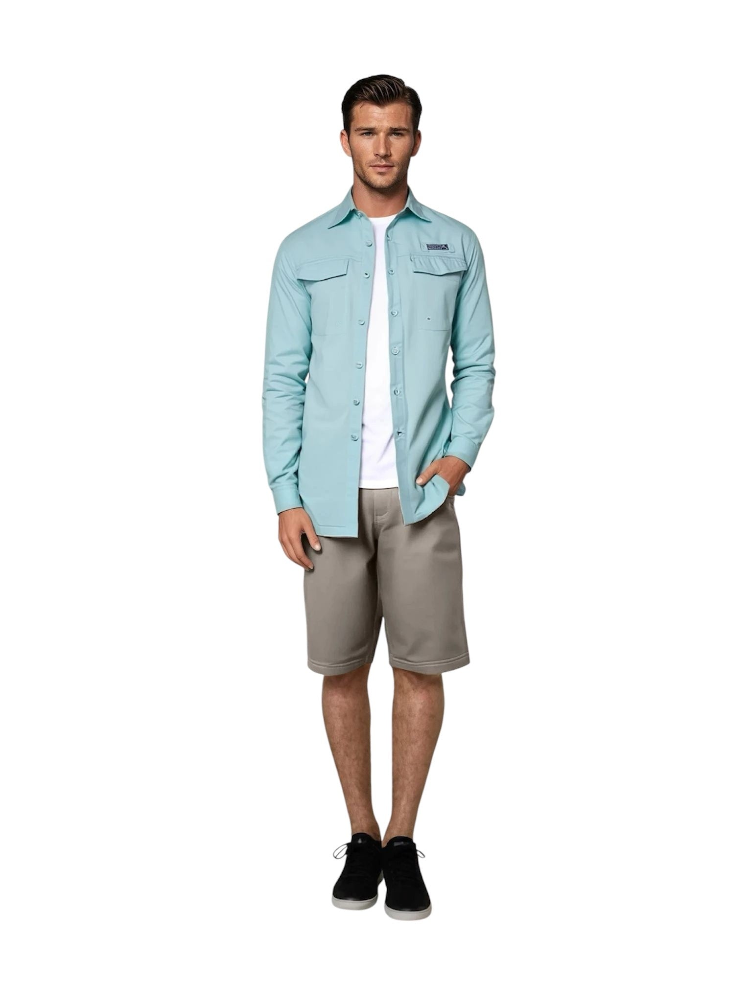 Man wearing a light blue shirt and beige shorts on a white background