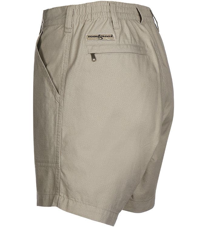 Beige shorts with a brand logo on a white background