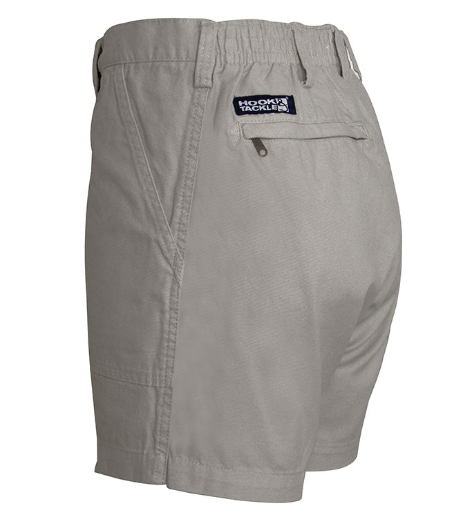 Gray shorts with a logo on the pocket against a white background