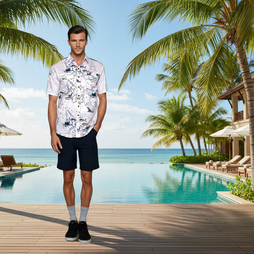Man wearing a white patterned shirt and black shorts on a white background
