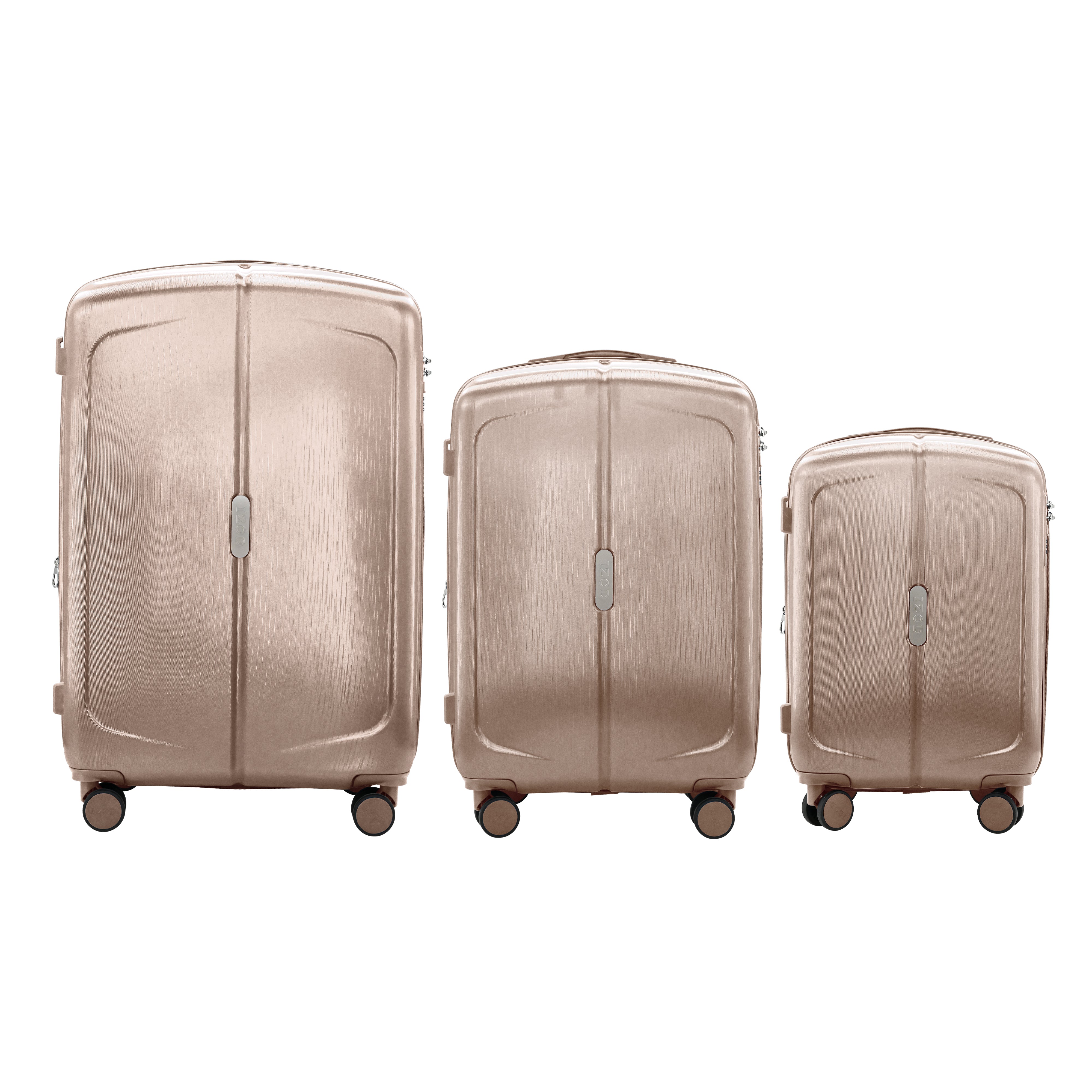 Set of three beige suitcases of different sizes on a white background