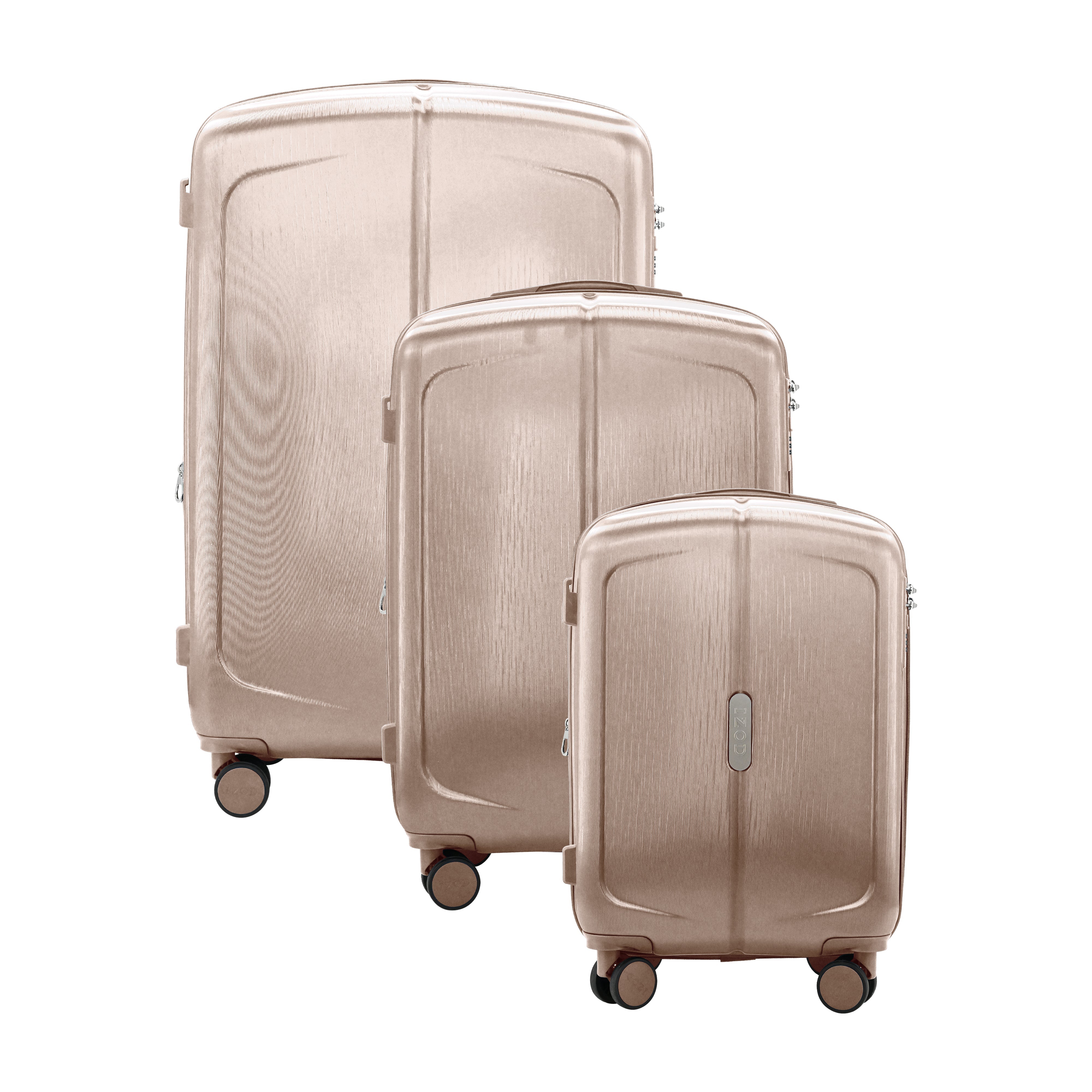 Set of three beige suitcases of different sizes on a white background