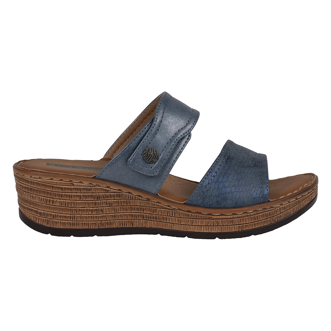 Blue sandal with brown sole on a white background