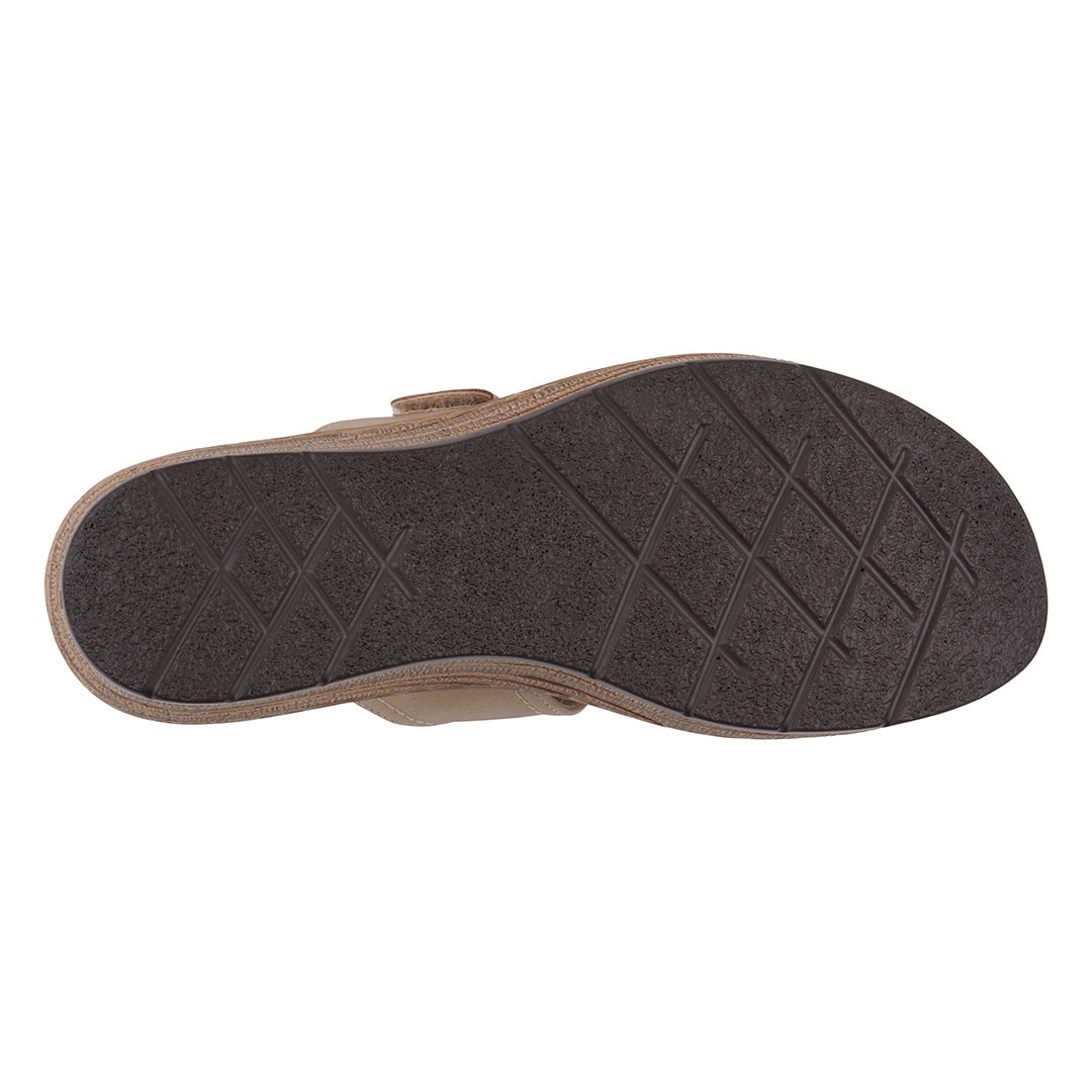 Brown sandal sole with textured pattern on a white background