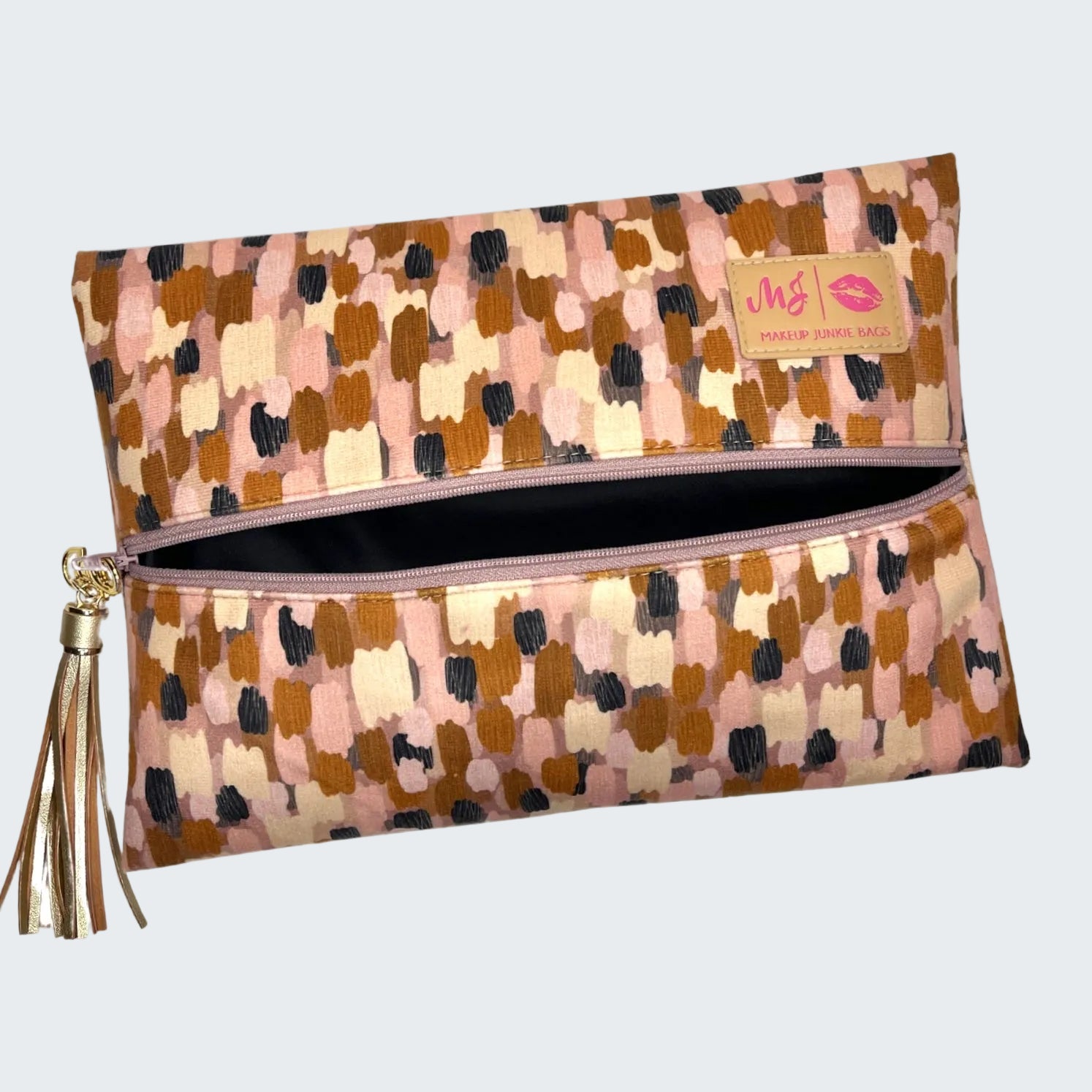 Patterned pouch with a tassel on a white background
