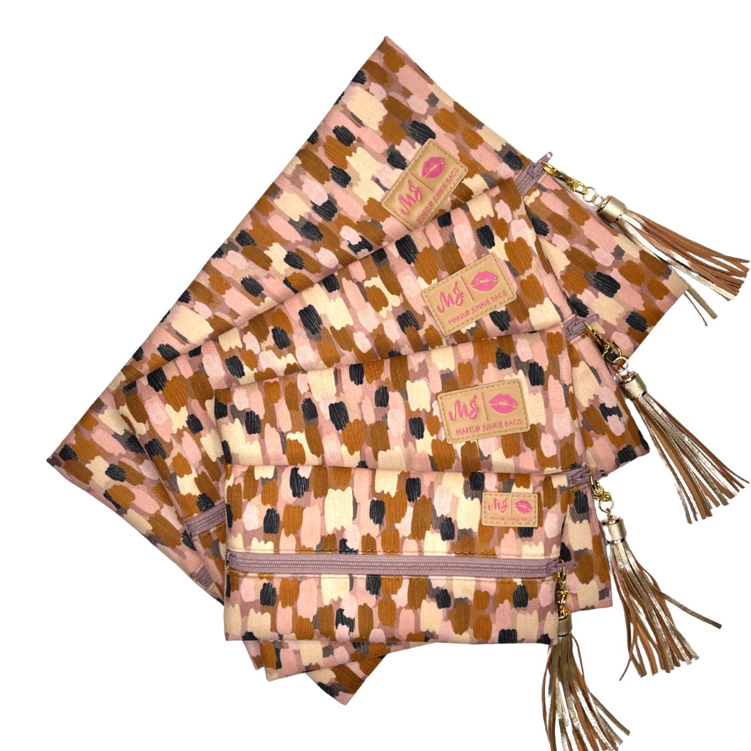 Set of patterned bags with tassels on a white background