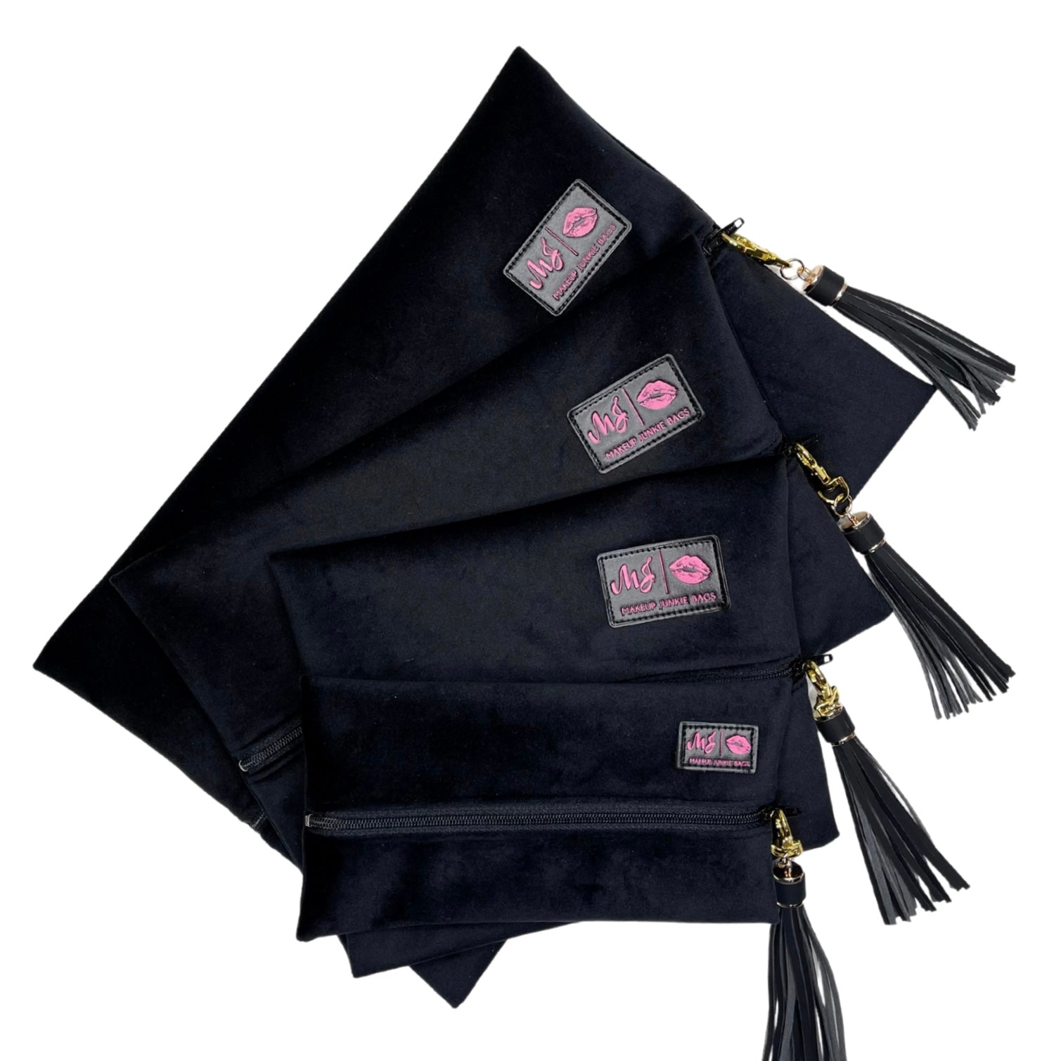 Set of black pouches with tassels and visible brand logos on a white background
