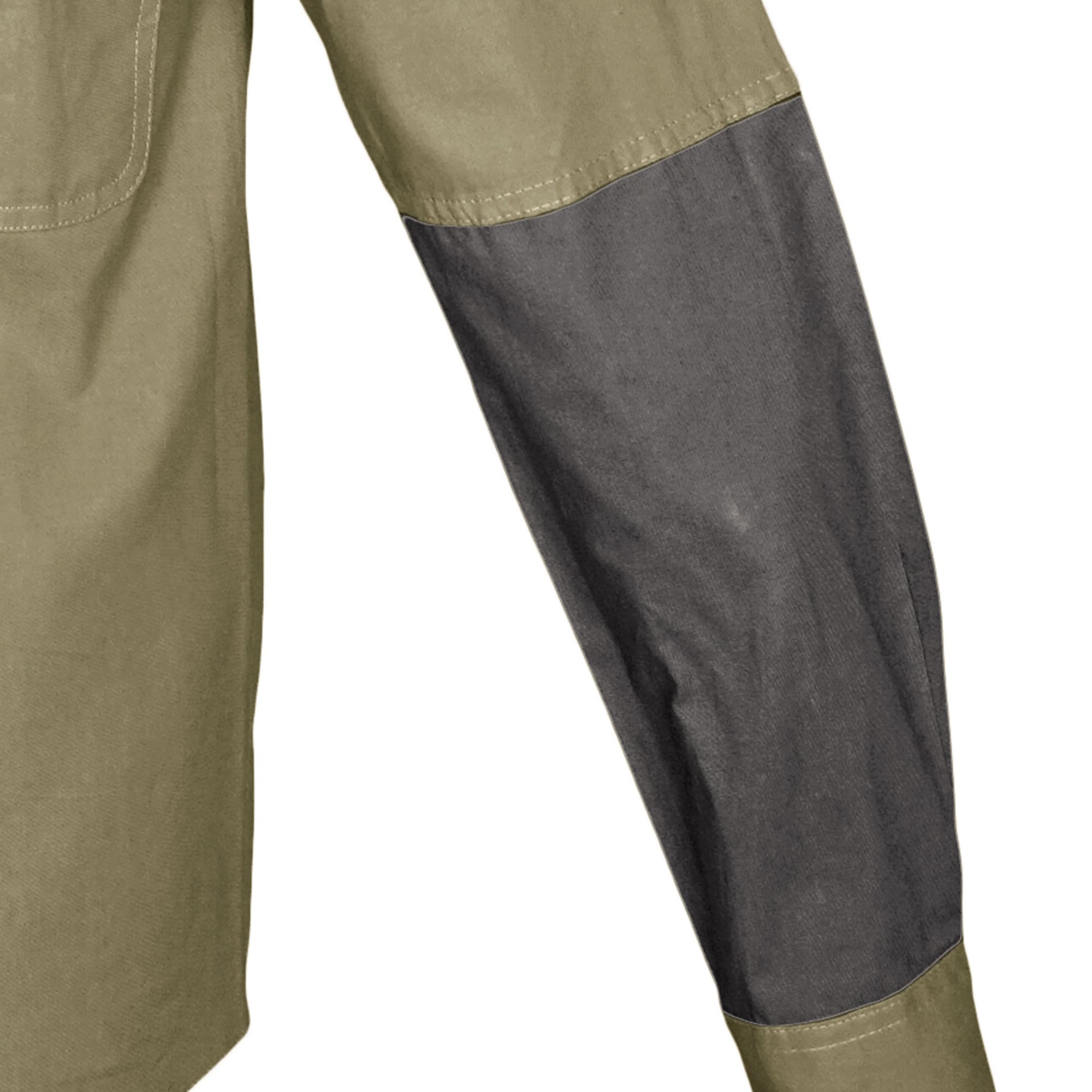 Two-tone pants with green and gray sections on a white background