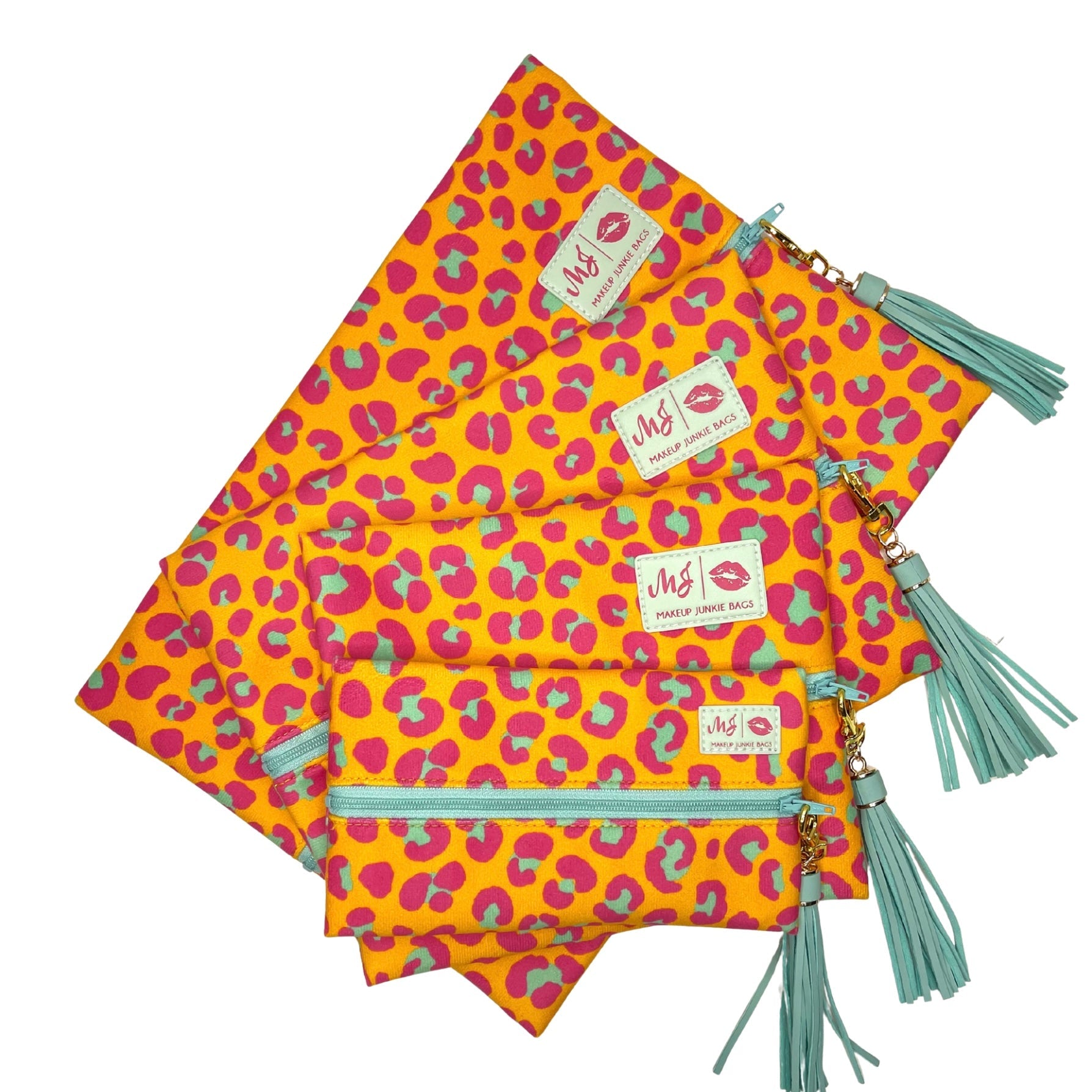 Set of three colorful pouches with leopard print pattern and tassels on a white background