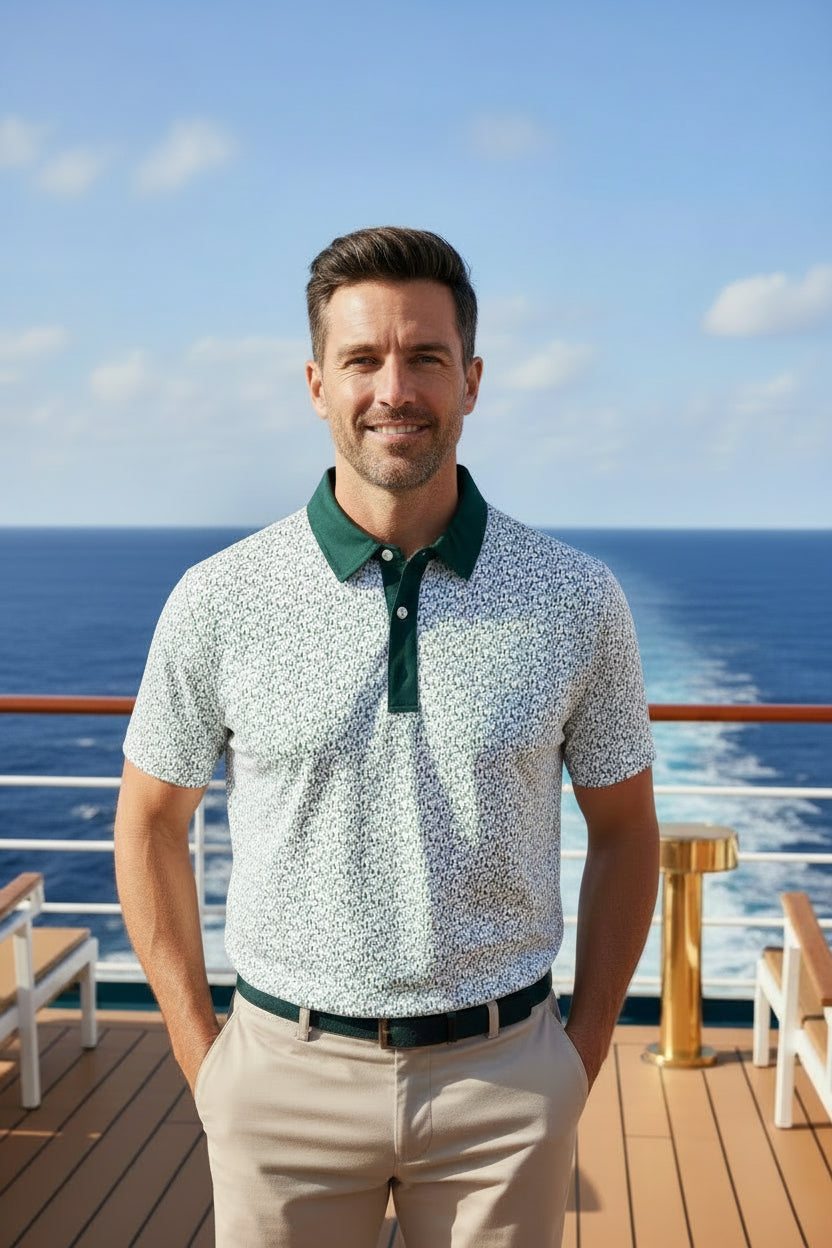 Polo shirt with a patterned design and green collar on a white background