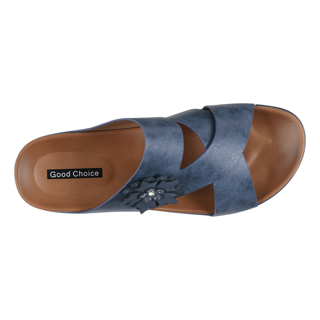 Blue sandal with brown sole on a white background