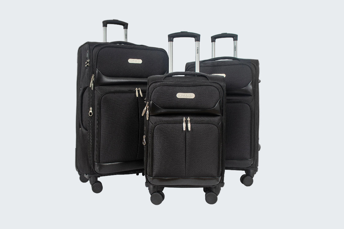 Set of black suitcases with wheels on a white background
