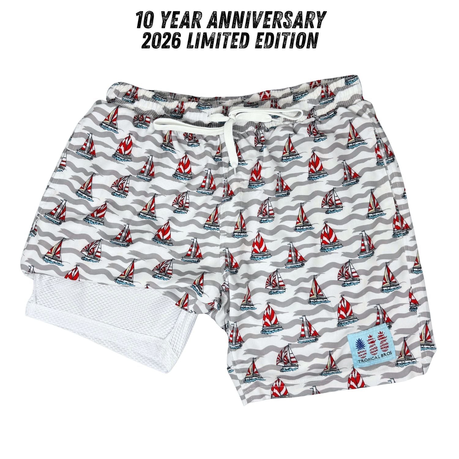 Shorts with sailboat pattern and 10 Year Anniversary text on a white background