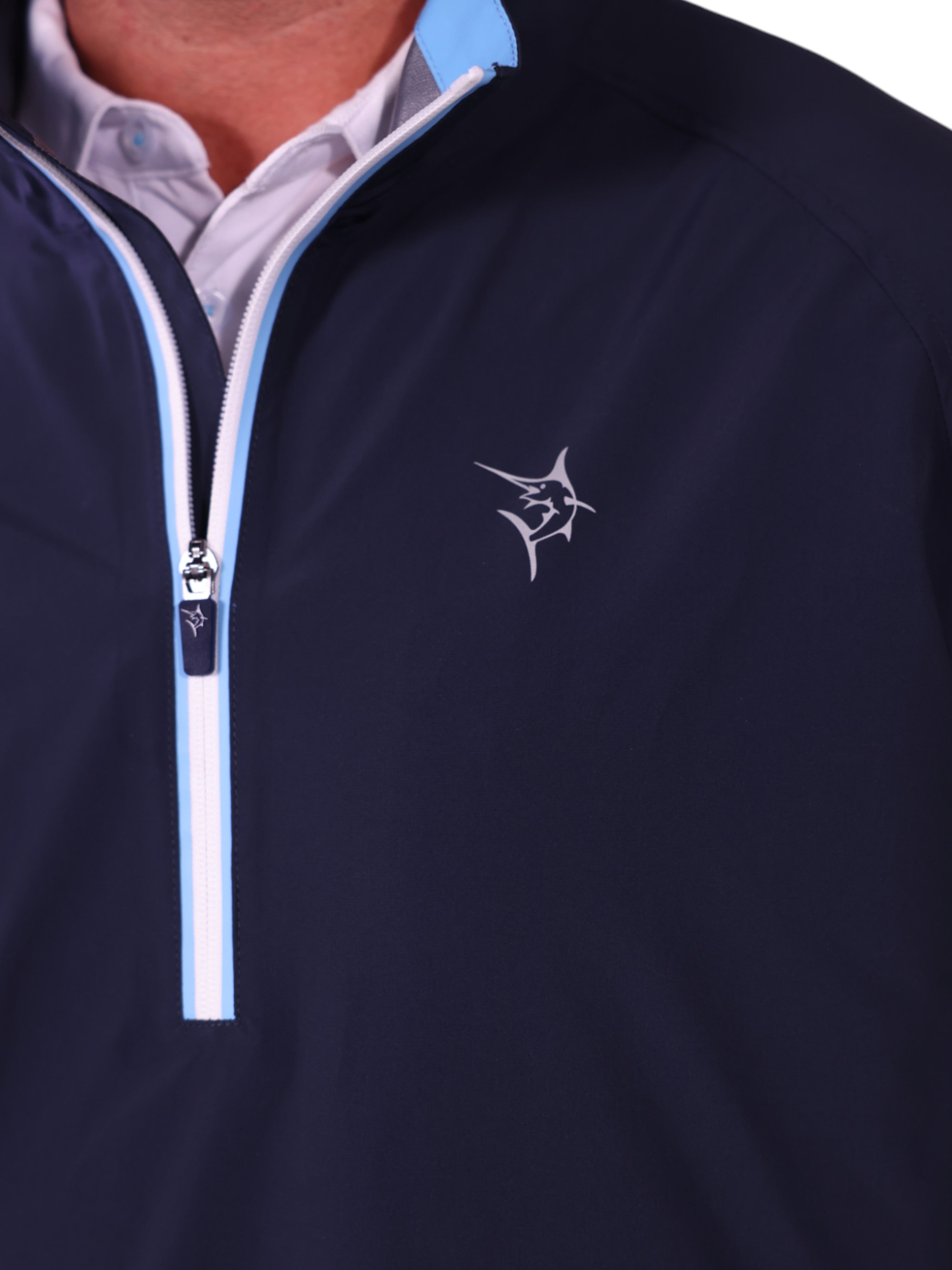 Navy half-zip pullover with a logo on a white background