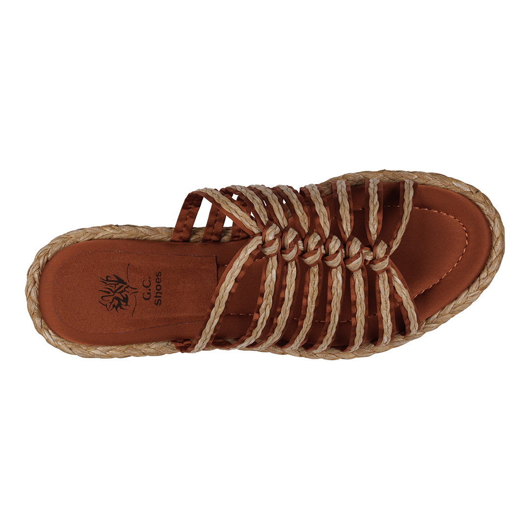 Brown sandal with jute straps on a white background