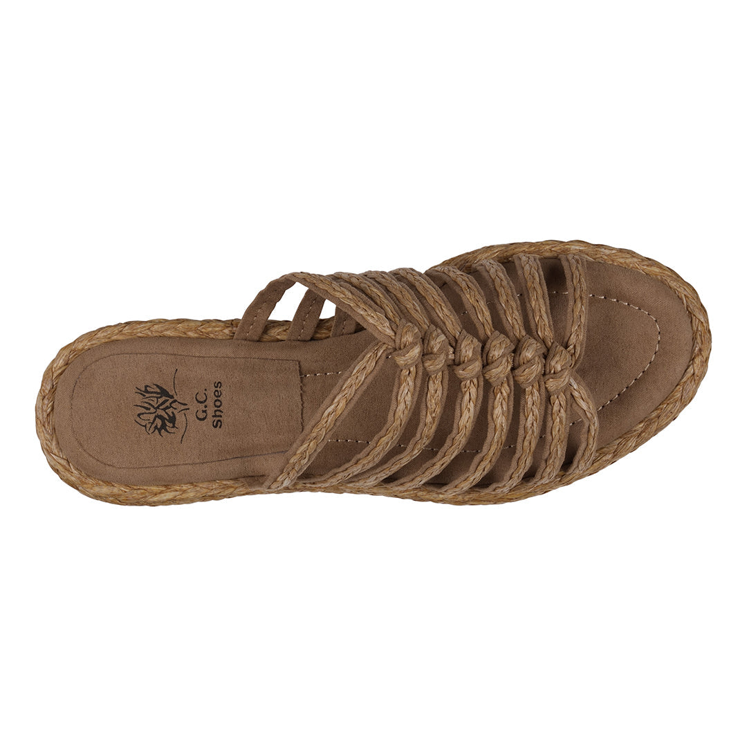 Brown sandal with braided design on a white background