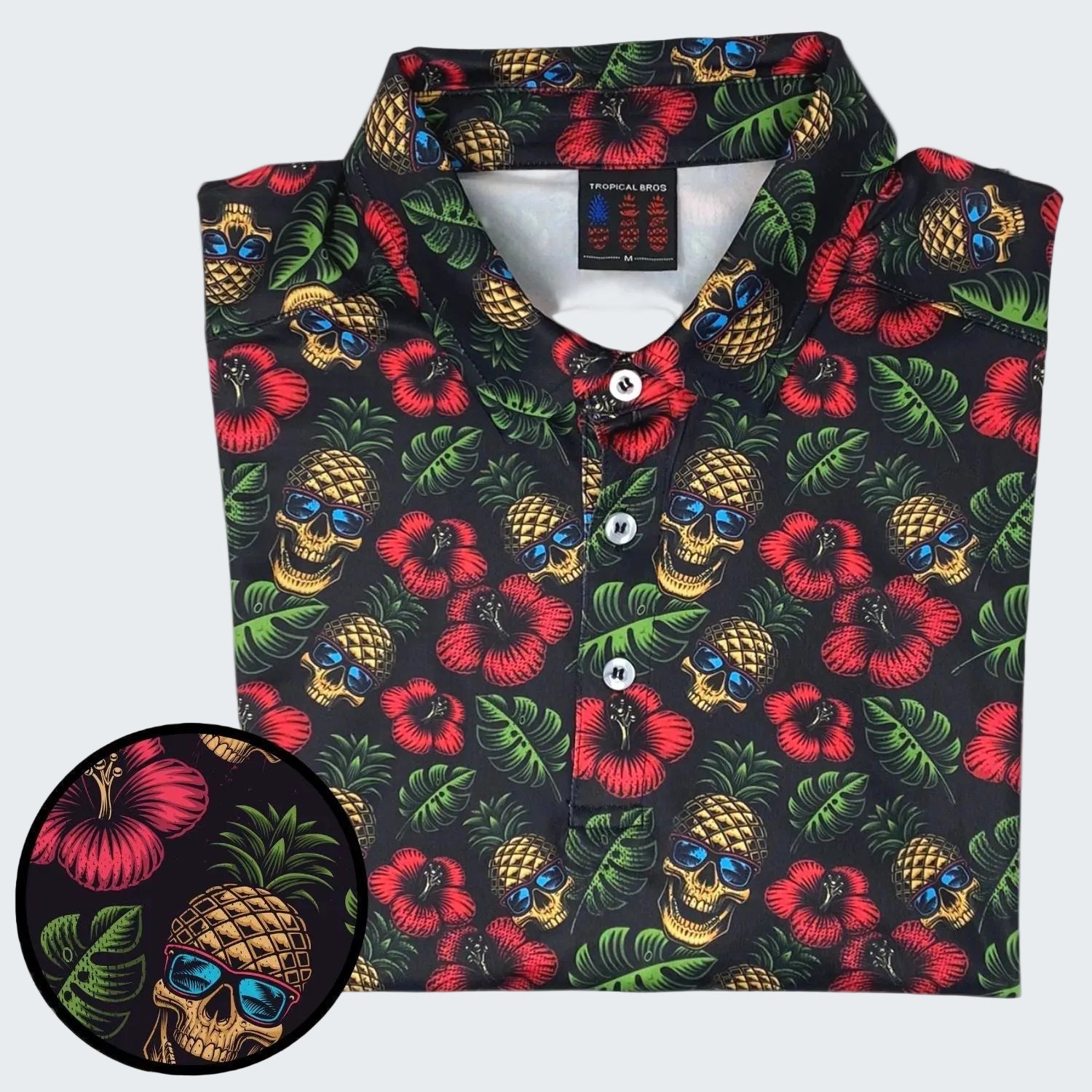 Colorful patterned shirt with skull and pineapple design on a white background