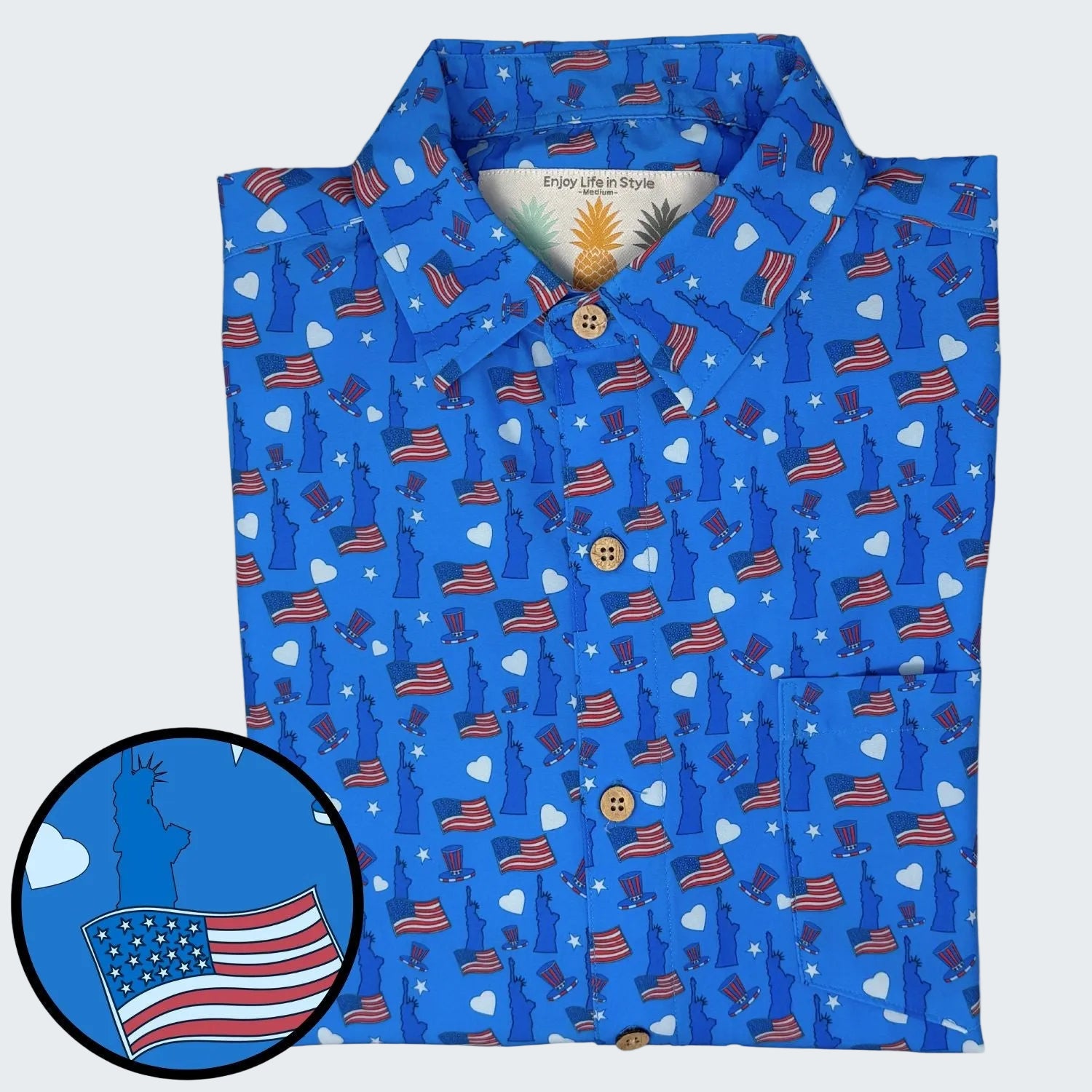 Blue shirt with Statue of Liberty and American flag pattern on a white background