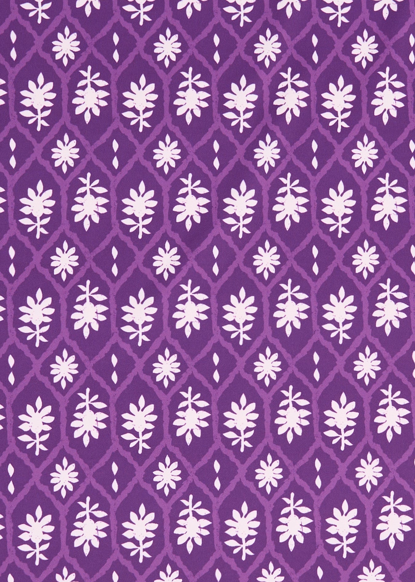 White floral pattern on a purple background