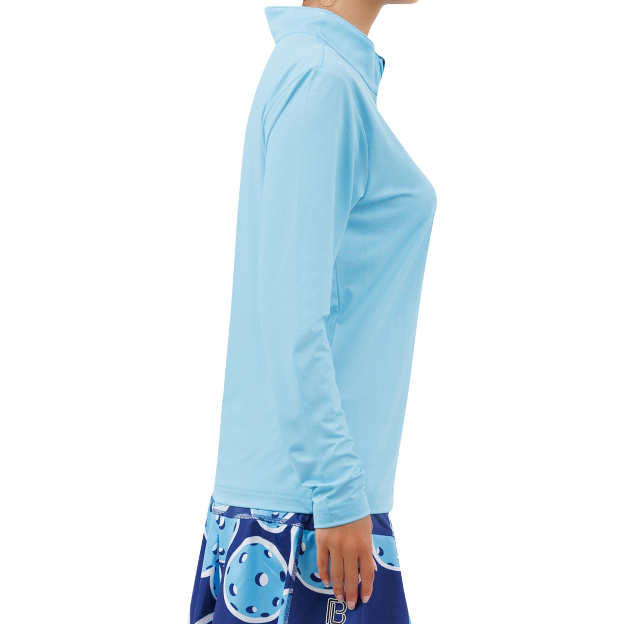 Light blue long-sleeve top worn by a person on a white background