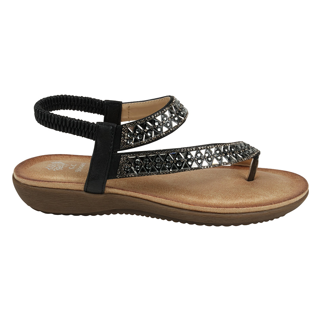 Black sandal with a decorative strap on a white background